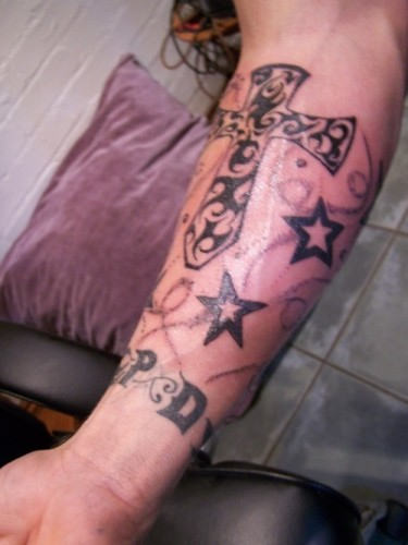 Tribal Cross And Star Tattoos On Forearm