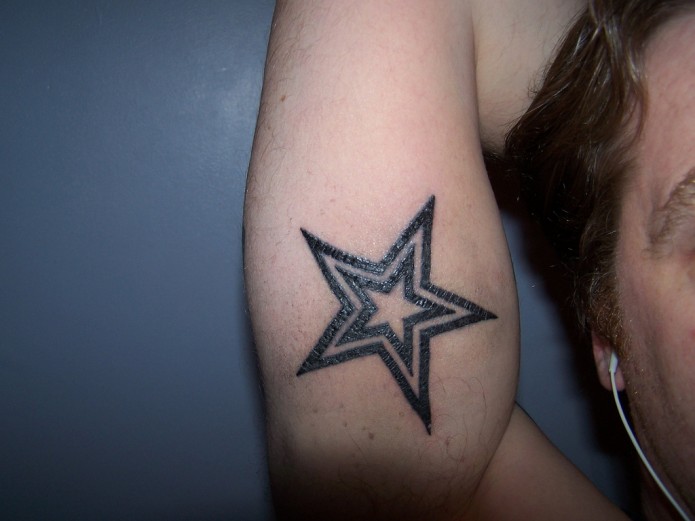 Tribal Double Star Tattoo On Inner Bicep