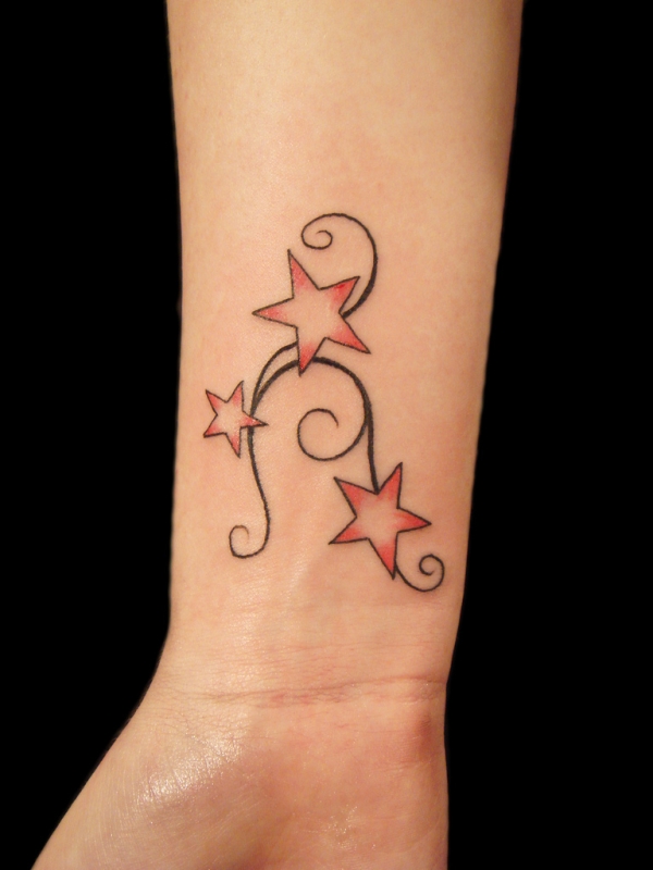 Tribal Pink Star Tattoos On Wrist