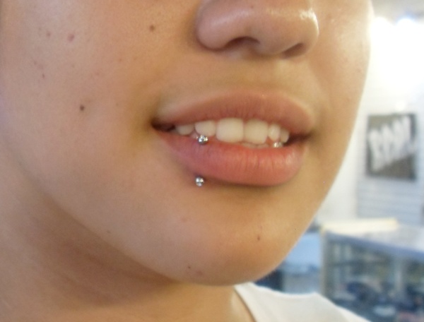Vertical Side Labret Piercing With Silver Barbell