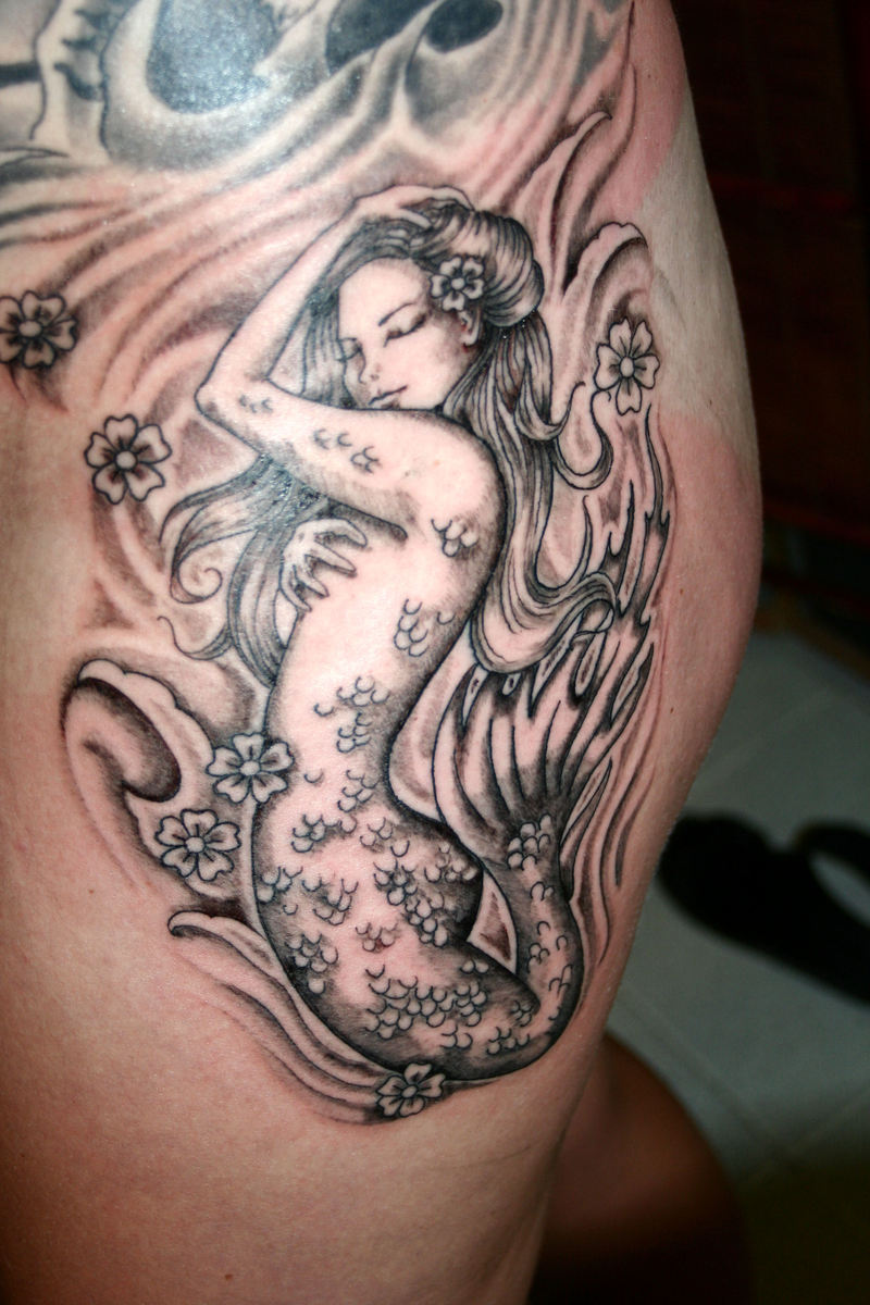 Wonderful Black Ink Mermaid Tattoo Design For Girl