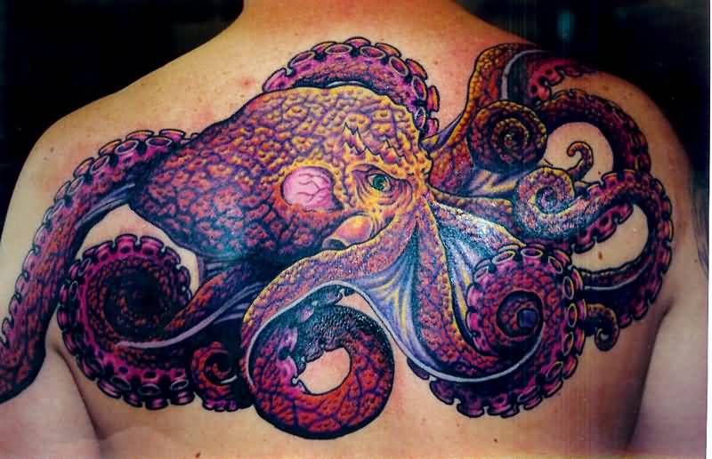 Wonderful Colorful Octopus Tattoo On Man Upper Back