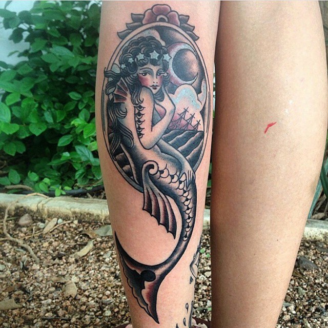 Wonderful Mermaid In Frame Tattoo On Left Leg Calf