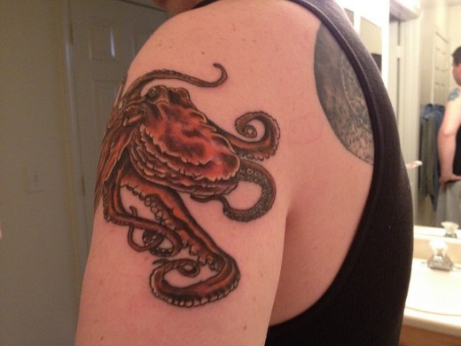 Wonderful Octopus Tattoo On Women Left Shoulder