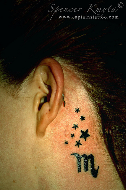Zodiac Scorpio Sign And Black Star Tattoos Behind Ear