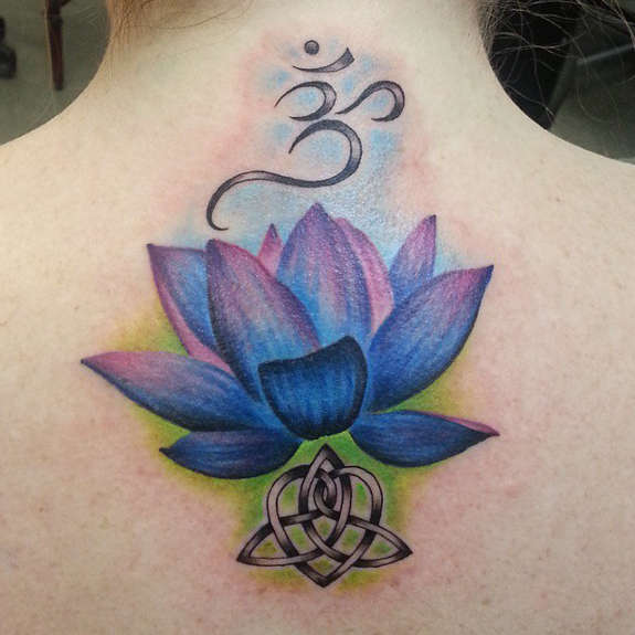 Awesome Purple Ink Lotus Flower Tattoo On Upper Back