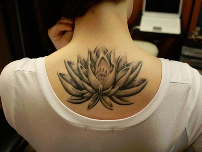 Black And White Lotus Tattoo On Upper Back