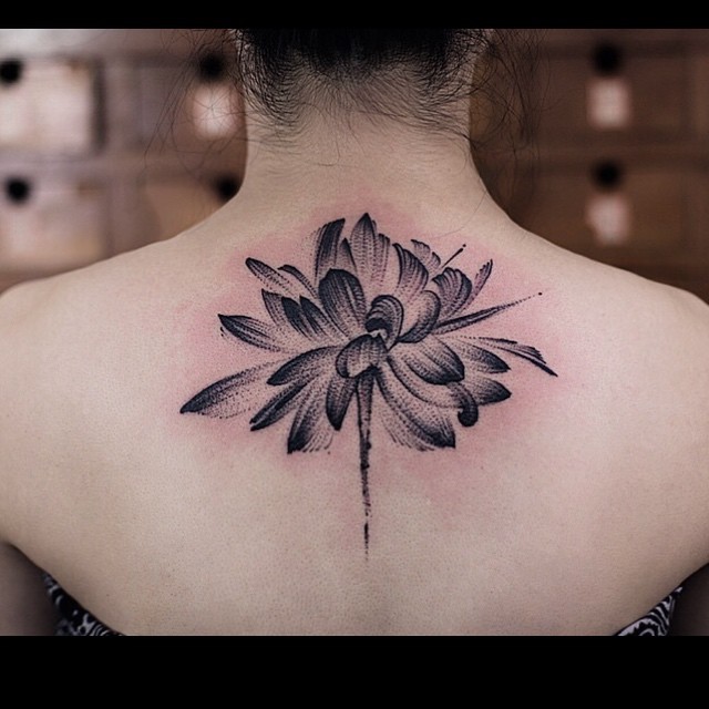 Black Ink Lotus Flower Tattoo On Upper Back