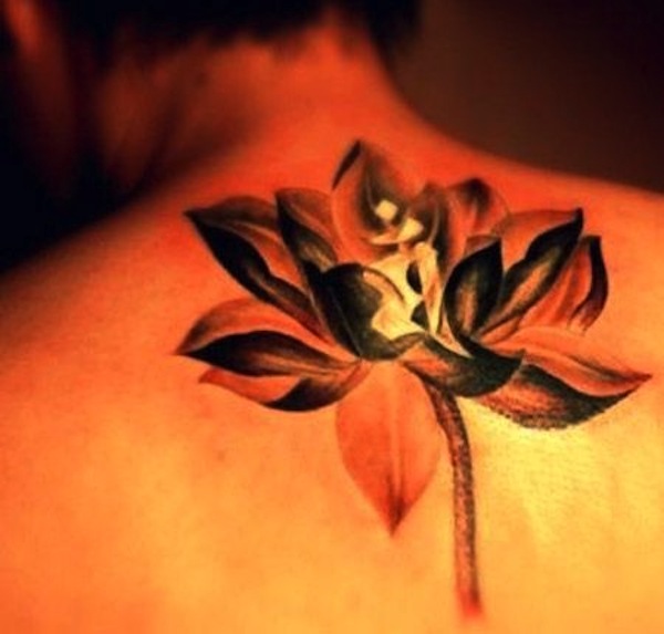 Black Ink Lotus Flowers Tattoo Design On Upper Back