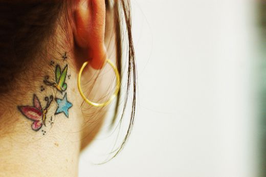 Butterflies And Blue Star Tattoo On Girl Side Neck