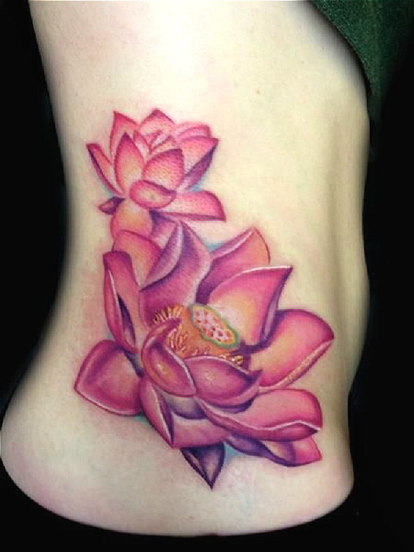 Pink Ink Two Lotus Flowers Tattoo On Right Side Rib