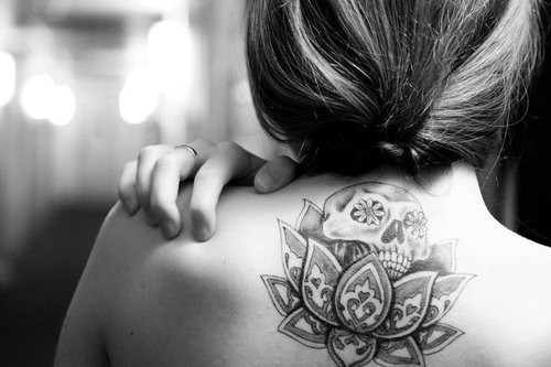 Unique Black And White Lotus With Sugar Skull Tattoo On Girl Upper Back