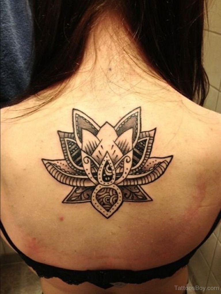 Wonderful Black And White Lotus Tattoo On Girl Upper Back
