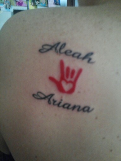 Aleah Ariana I Love You Sign Tattoo On Left Back Shoulder