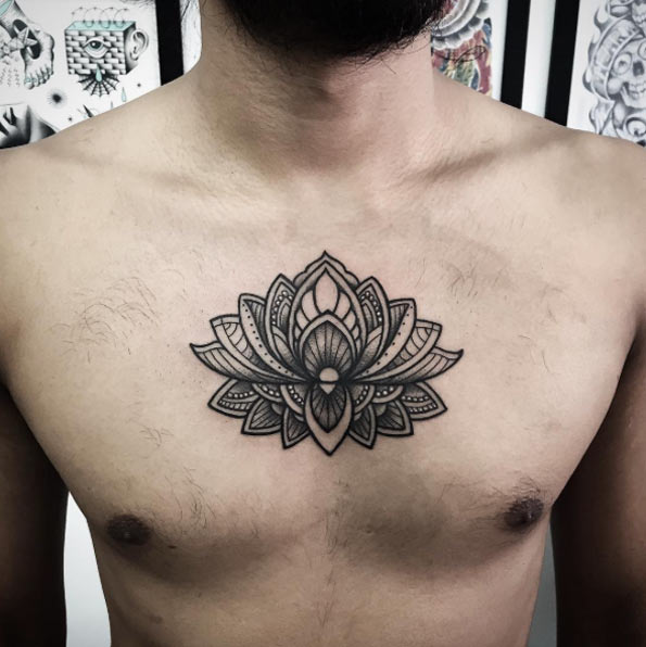 Amazing Black Ink Lotus Flower Tattoo On Man Chest By Ishi Neve
