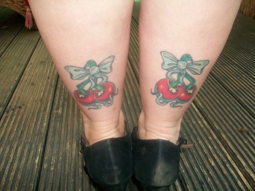 Amazing Bow Cherry Tattoos On Girl Back Legs