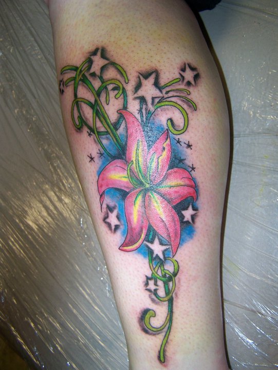 Amazing Stars And Lily Tattoo On Side Leg