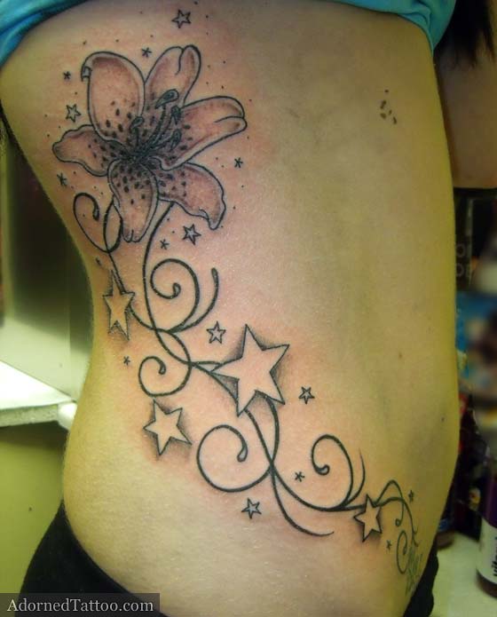 Amazing Stars And Tiger Lily Tattoo On Side Rib