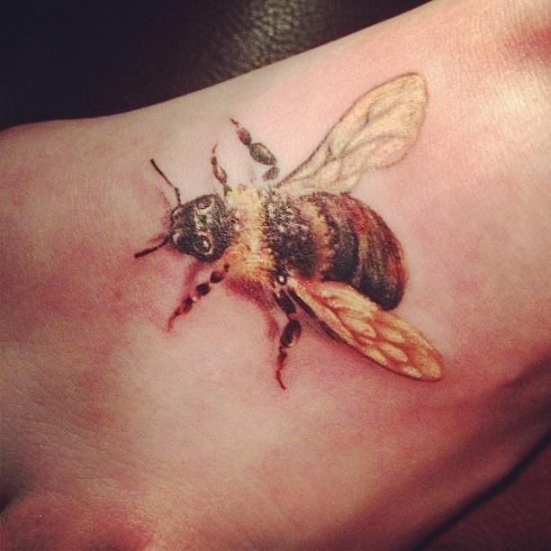 Attractive 3D Bumblebee Tattoo On Left Foot