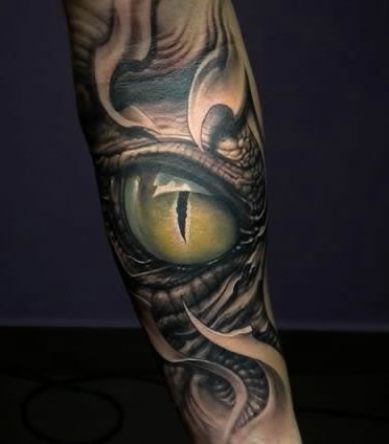 Attractive 3D Snake Eye Tattoo On Forearm