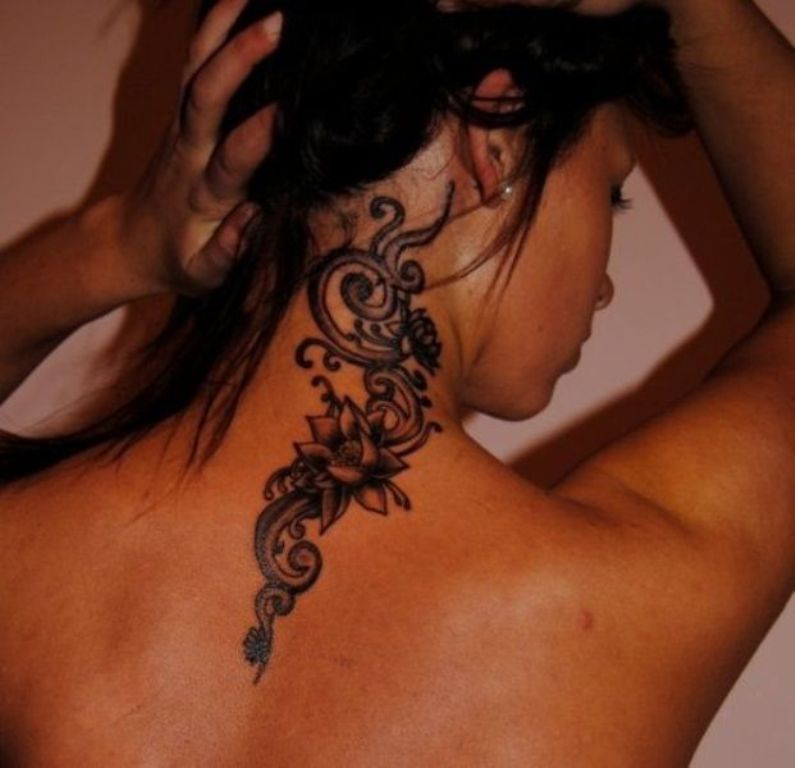 Attractive Black Ink Lotus Flower Tattoo On Girl Back Neck