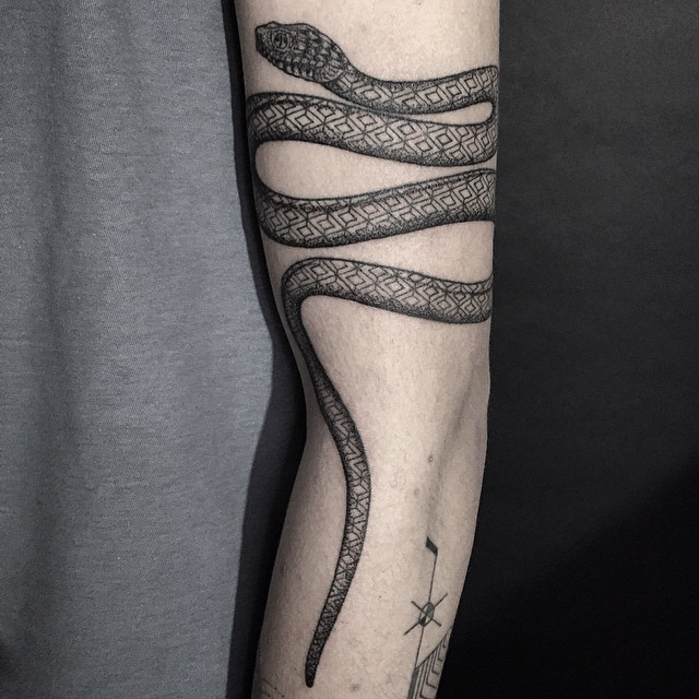 Attractive Black Ink Snake Tattoo On Left Full Arm