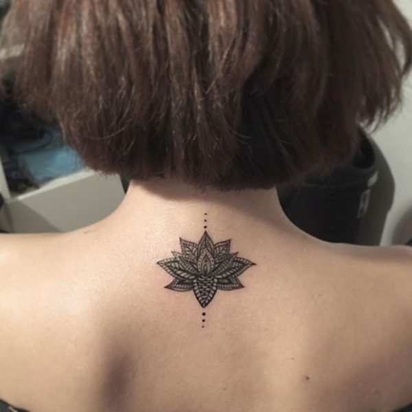 Attractive Black Lotus Tattoo On Upper Back