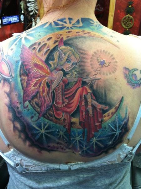 Attractive Colorful Fairy On Half Moon Tattoo On Girl Upper Back