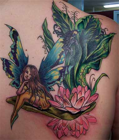 Attractive Fairy With Flower Tattoo On Right Back Shoulder
