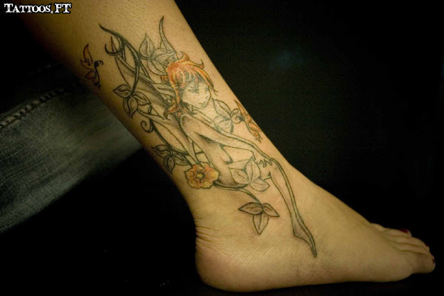 Attractive Fairy With Fowers Tattoo On Right Ankle