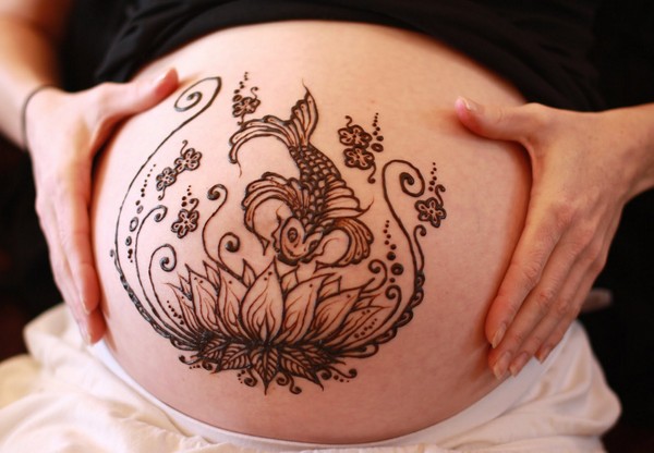 Attractive Henna Lotus Flower With Flying Birds Tattoo On Stomach