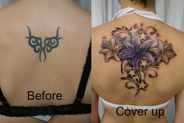 Attractive Lily Cover Up Tattoo On Girl Upper Back
