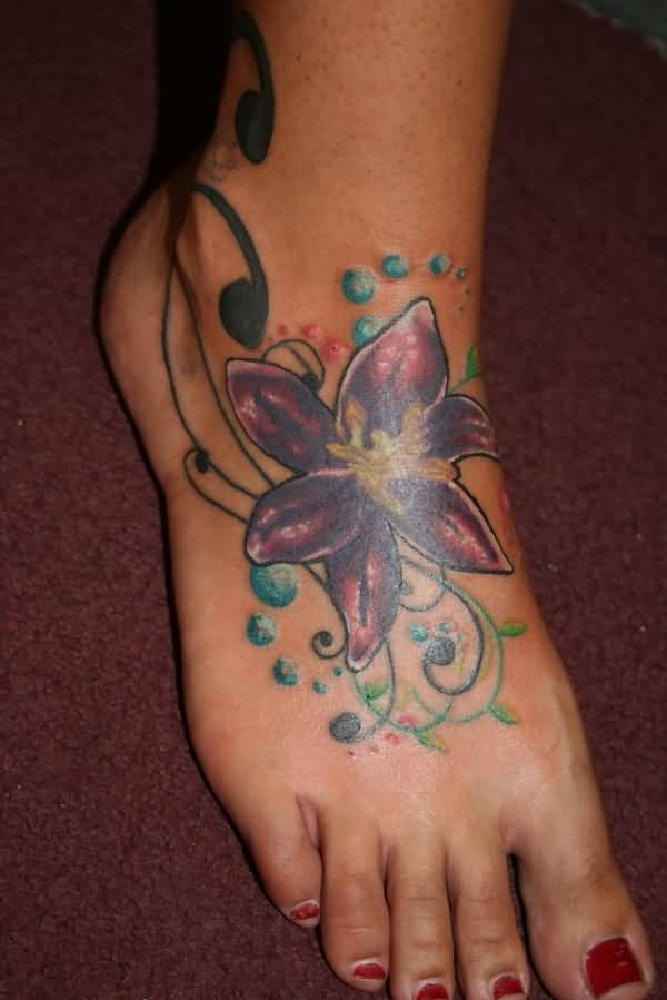 Attractive Lily Flower Tattoo On Girl Right Foot