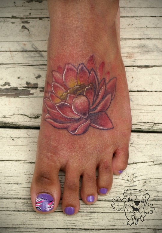 Attractive Lotus Flower Tattoo On Girl Left Foot