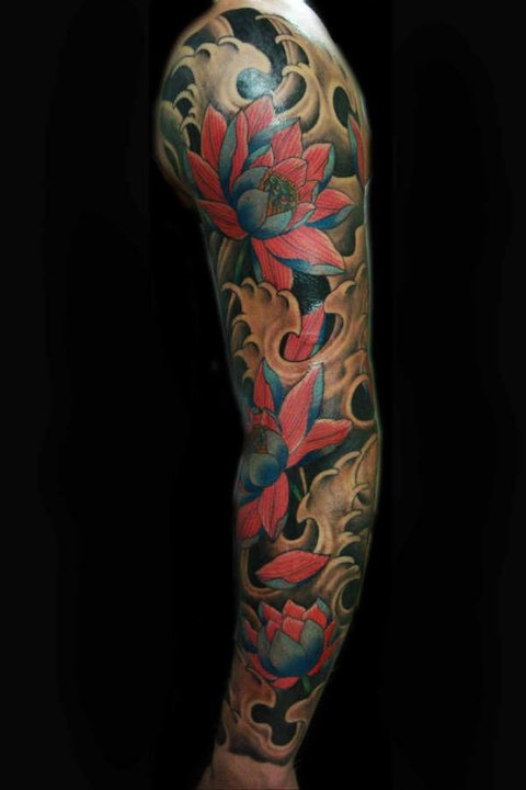 Attractive Lotus Flowers Tattoo On Left Full Sleeve