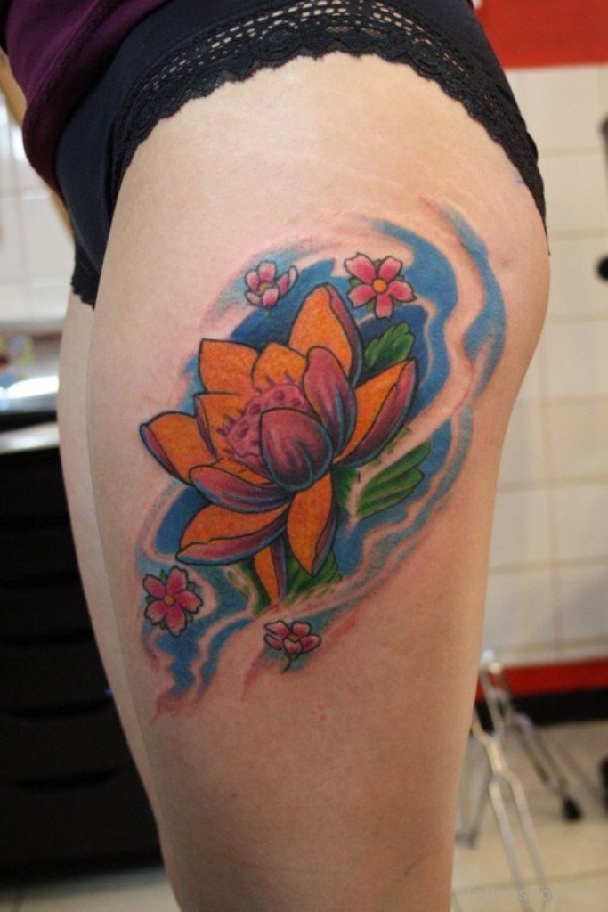 Attractive Lotus Flowers Tattoo On Left Thigh