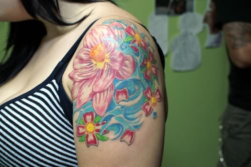 Attractive Lotus Tattoo On Left Shoulder