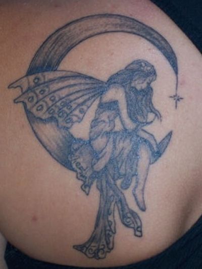 Awesome Black And Grey Fairy On Half Moon Tattoo On Left Back Shoulder