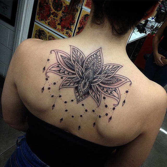 Awesome Black Ink Mandala Lotus Flower Tattoo On Girl Upper Back