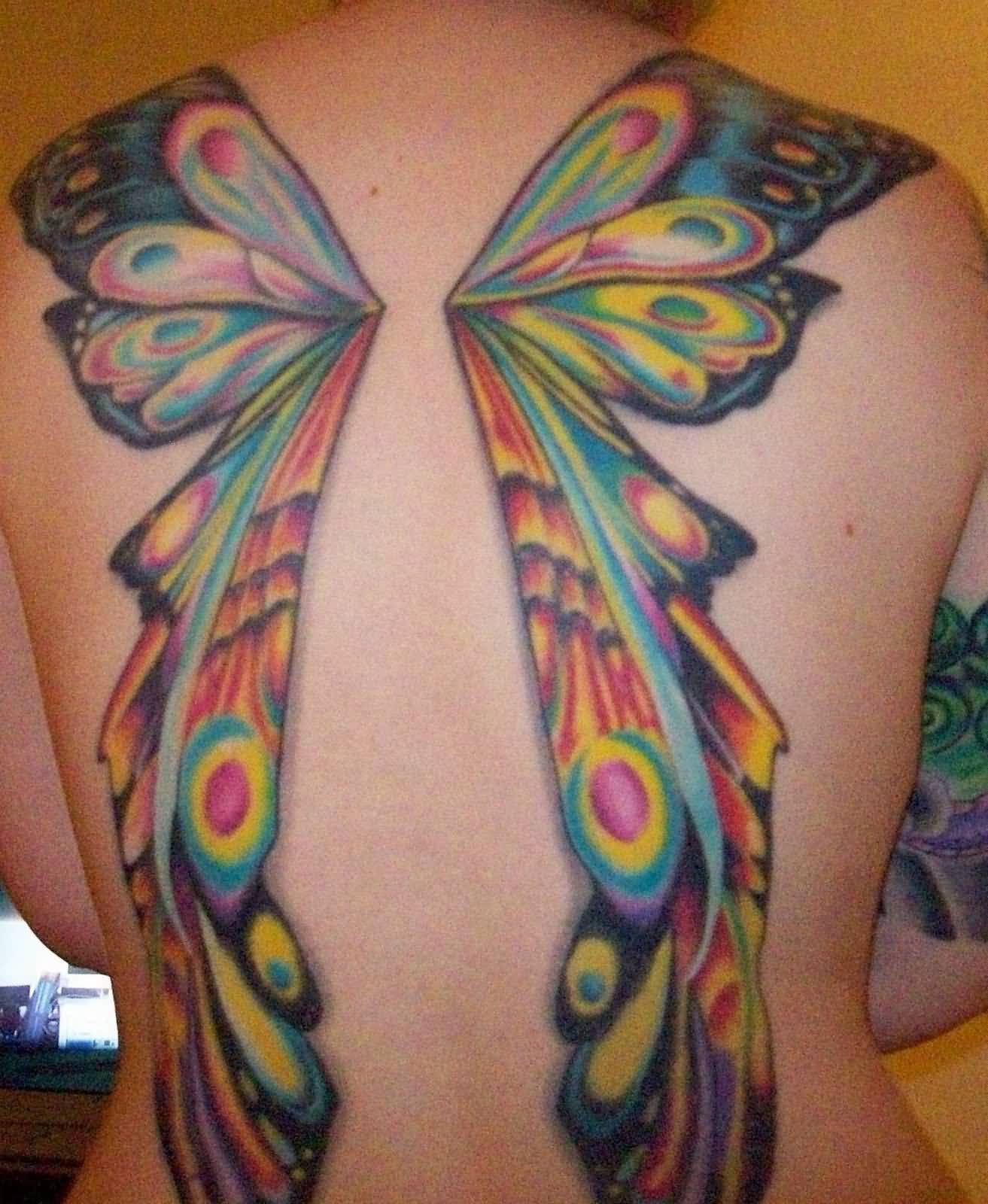 Awesome Colorful Fairy Wings Tattoo On Girl Full Back