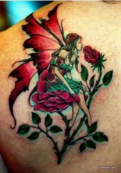 Awesome Colorful Fairy With Flowers Tattoo On Left Back Shoulder