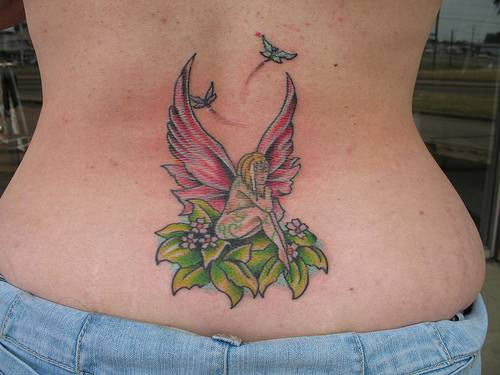 Awesome Colorful Fairy With Flying Butterflies Tattoo On Lower Back