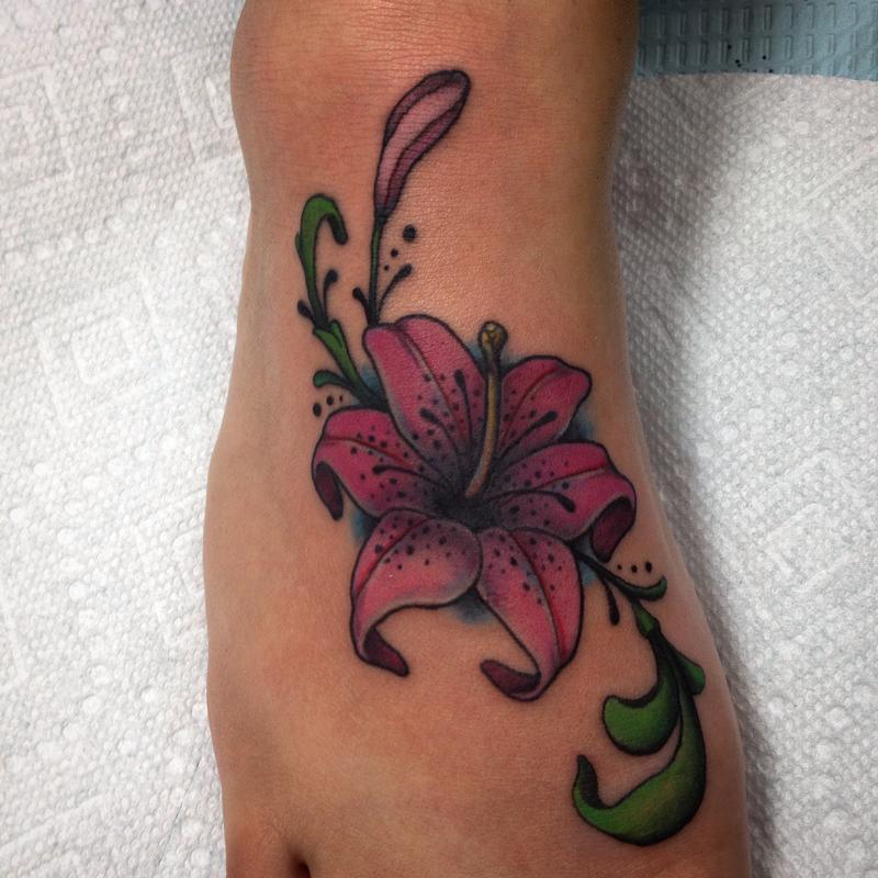 Awesome Lily Flower Tattoo On Girl Right Foot