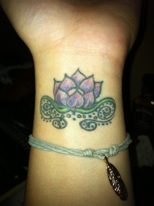 Awesome Lotus Flower Tattoo On Left Wrist