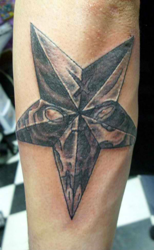 Awesome Nautical Star Tattoo On Left Sleeve