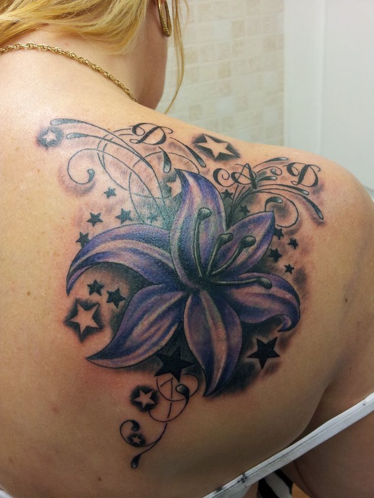 Beautiful Stars And Lily Flower Tattoo On Right Back Shoulder