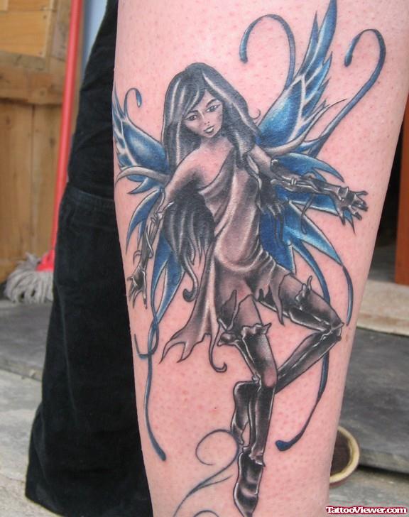 Black And Blue Fairy Tattoo On Arm