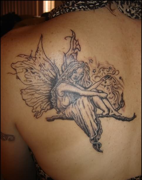 Black And Grey Fairy On Branch Tattoo On Left Back Shoulder