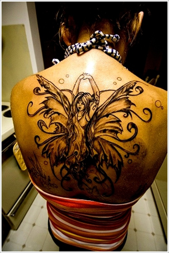 Black And Grey Fairy Tattoo On Girl Upper Back