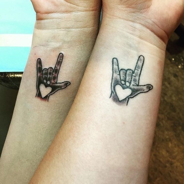 Black And Grey I Love You Symbol Tattoos On Wrists